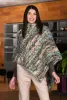 ponchoeffettomulticolor FW24.jpg (417